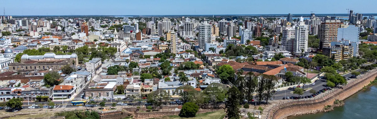 Stunning aerial view of Corrientes, Argentina, showcasing city skyline and scenic waterfront.