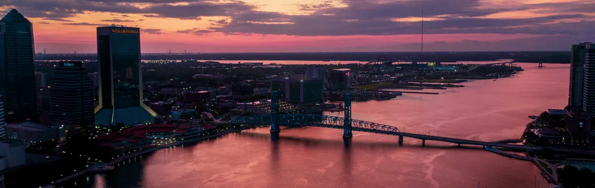 A breathtaking view of Jacksonville's urban skyline captured during a vibrant sunset.