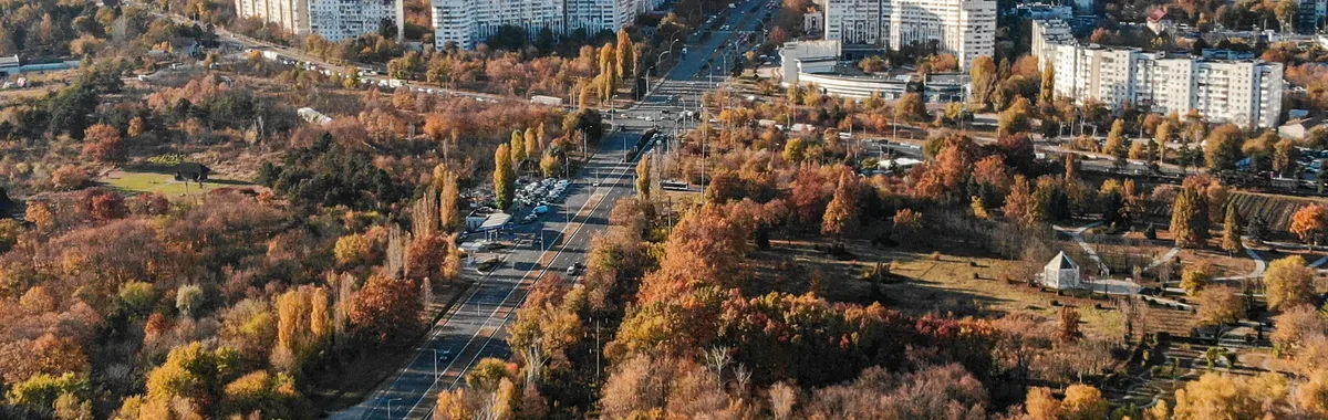 A stunning aerial shot capturing Chișinău, Moldova in vibrant autumn colors.