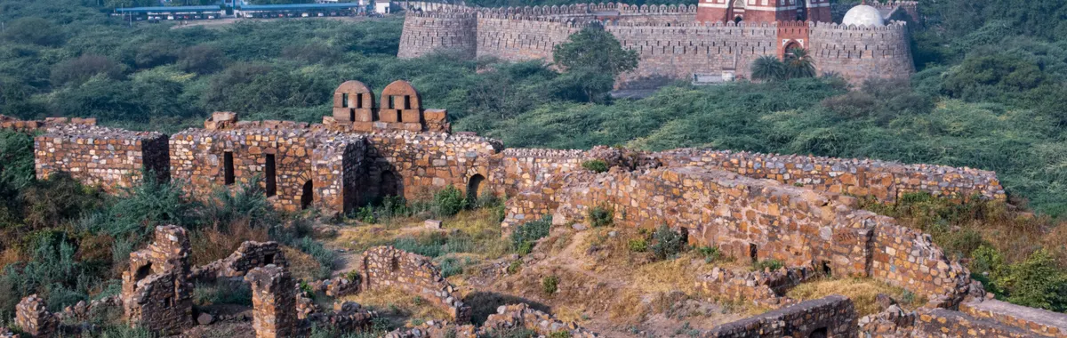 Explore the historic ruins of Tughlaqabad Fort, a significant landmark in New Delhi, India.