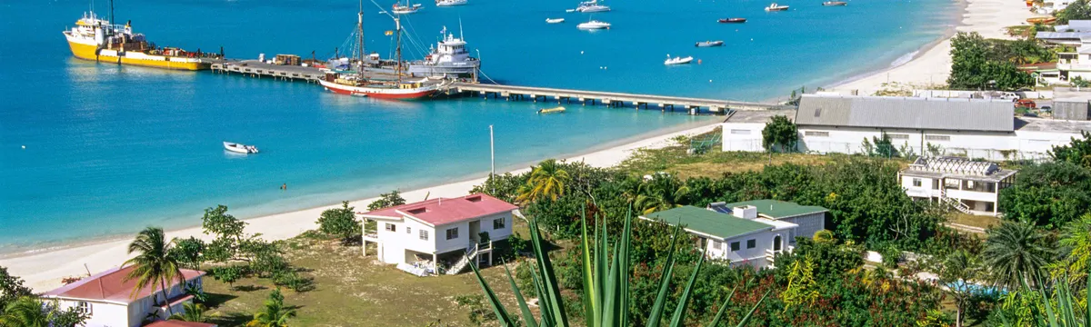 אנגווילה: Stunning aerial view of Sandy Ground Bay in Anguilla with boats and turquoise waters.