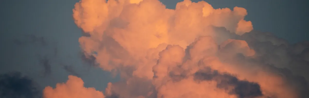 Capture of vibrant cumulus clouds at sunset over Tiraspol, Moldova, showcasing a dramatic sky.