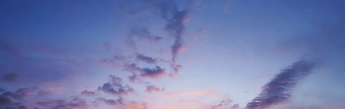 Dramatic sunset sky with vivid colors and clouds in Laval, France.