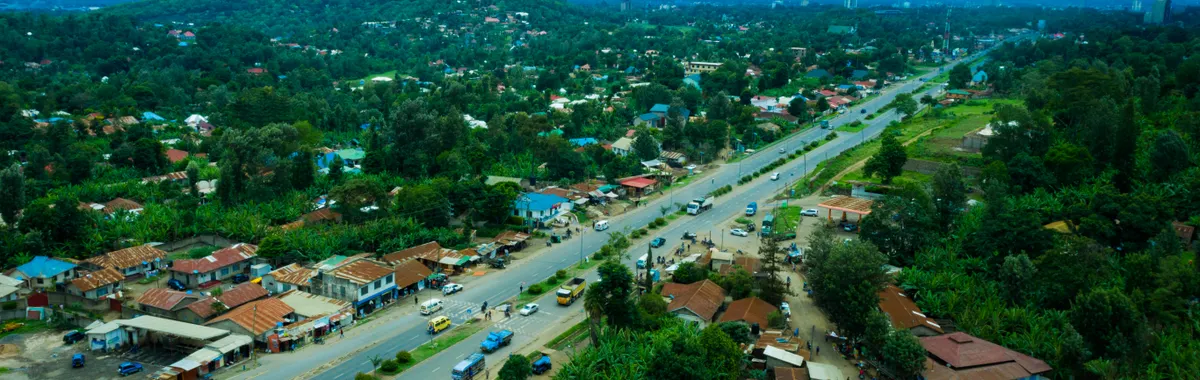 Aerial view of Arusha, Tanzania showcasing scenic landscapes and urban life.