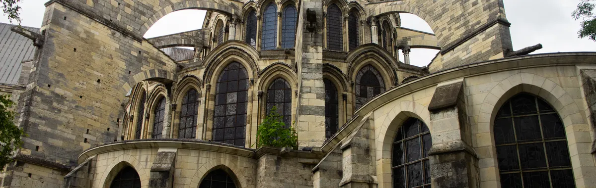 Explore the medieval gothic design of Saint Remi Basilica in Reims, France.