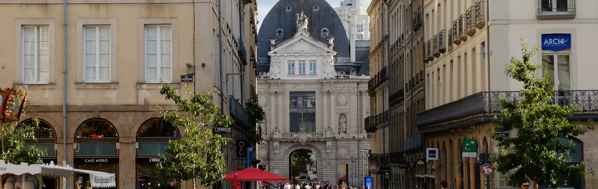 Explore the bustling streets of Rennes, France in this beautiful urban cityscape.