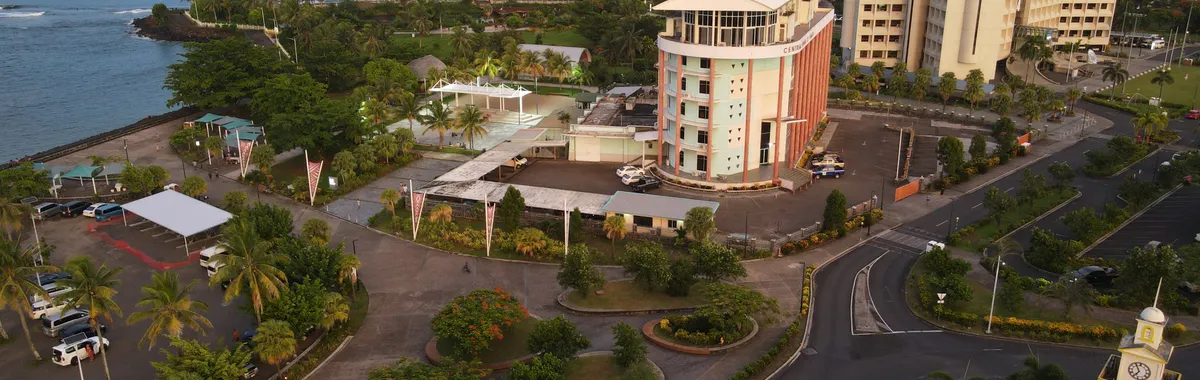 Stunning aerial view of Apia, Samoa featuring coastal cityscape and landmarks.
