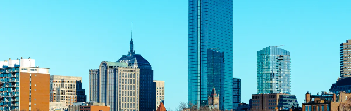 Stunning view of Boston's skyline featuring the iconic John Hancock Tower and modern architecture.