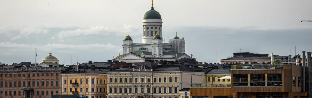 Beautiful view of Helsinki Cathedral and surrounding buildings by the waterfront in Helsinki, Finland.
