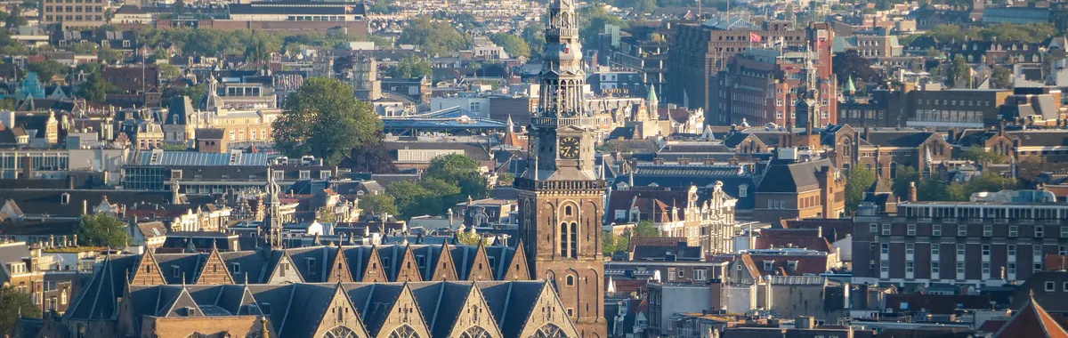 Aerial view showcasing Amsterdam's historic architecture, highlighting a stunning skyline.