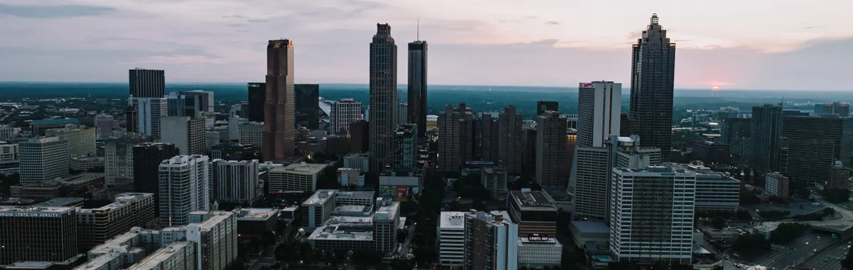 Stunning aerial view of Atlanta, Georgia skyline during sunset, showcasing modern architecture.