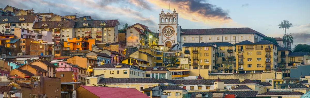 Vibrant view of Antananarivo's architectural blend during sunset, showcasing diverse rooftops and historical charm.