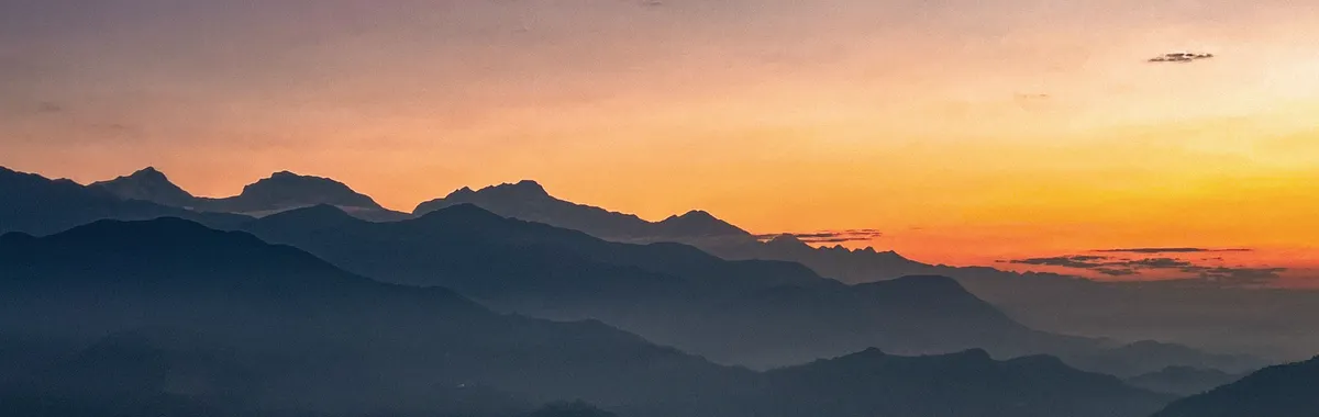 Hazy morning view of Annapurna mountains at sunrise from Pokhara, Nepal.