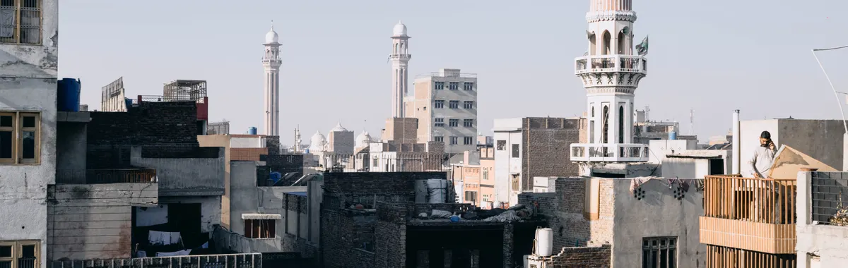 Aerial view of Faisalabad, Punjab featuring traditional cityscape and iconic architecture.